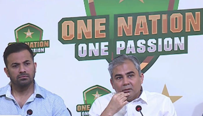 PCB Chairman Mohsin Naqvi (right) pictured alongside selection committee member Wahab Riaz during a press conference. — Screengrab/AFP/File