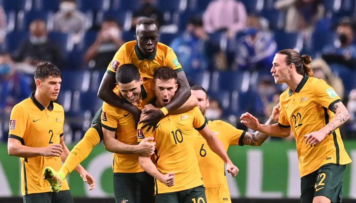 Australias midfielder Ajdin Hrustic (C) celebrates after scoring a goal against Japan at Saitama Stadium in Saitama. — AFP/File