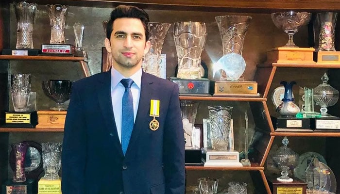 Squash player Danish Atlas Khan poses for a photo after receiving Tamgha-e-Imtiaz. — X/@DanishAtlasKhan/File