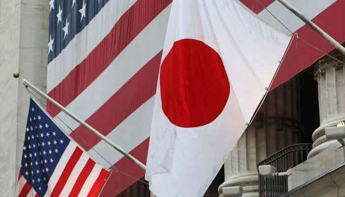 This representational image shows the flags of the United States (L) and Japan. — AFP/File