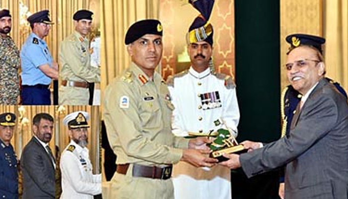 President Asif Ali Zardari distributes commendation shields to military and civil officers who successfully organized the Pakistan Day Parade, in a shield distribution ceremony at, Aiwan-i-Sadr on March 25, 2024. — APP