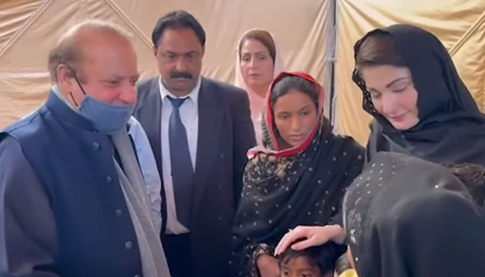 This screengrab taken from a video released on March 25, 2024, shows Punjab Chief MinsiterMaryam Nawaz and PML-N supremo Nawaz Sharif visiting the residence of  kite twine victim Asif Ashfaq in Faisalabad. — Facebook/Maryam Nawaz Sharif