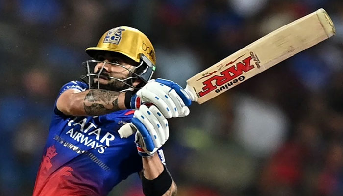 Royal Challengers Bengalurus Virat Kohli watches the ball after playing a shot against Punjab Kings during Monday’s Indian Premier League match in Bengaluru. — AFP/File