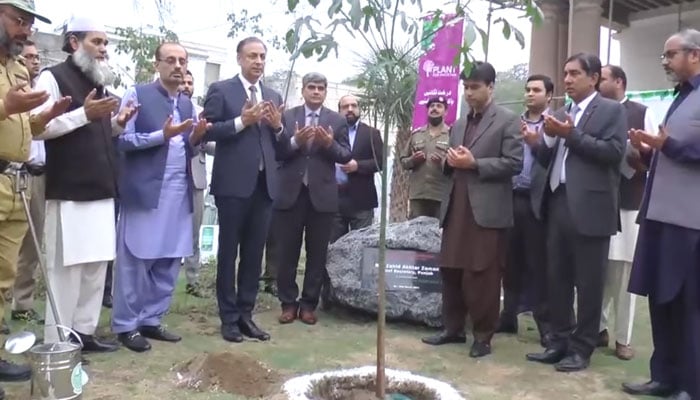 In this screengrab, Punjab Chief Secretary Zahid Akhtar Zaman (centre) and Major-General Shahid Nazir offer Fateha during the plantation drive at the Civil Secretariat on March 26, 2024. — Facebook/Chief Secretary Punjab