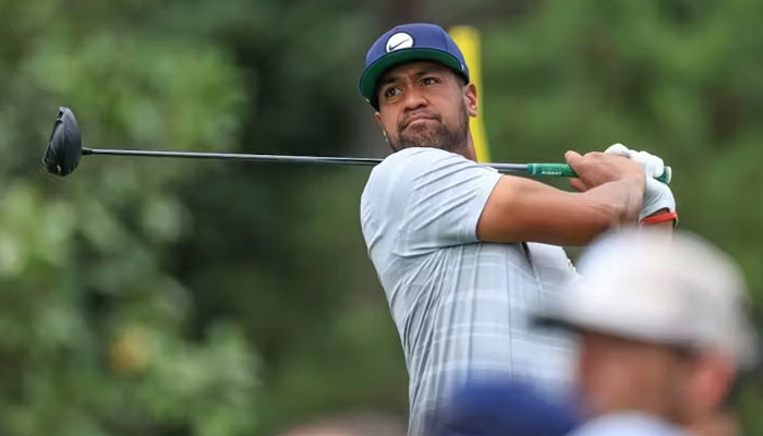 Tony Finau of The United States plays his tee shot on the fifth hole during the first round of the 2023 Masters Tournament on April 06, 2023. — AFP