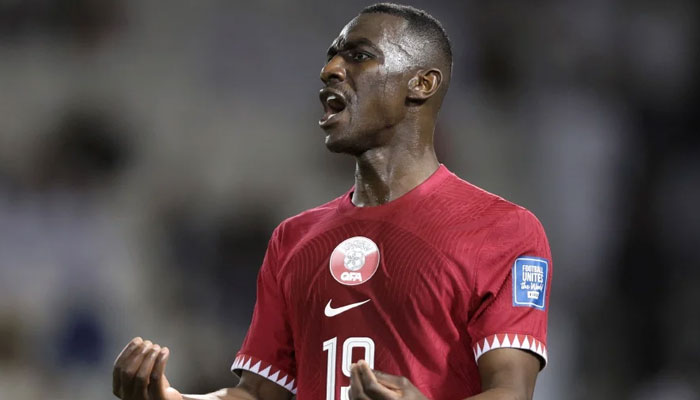 Qatars forward Almoez Ali reacts during the 2026 FIFA World Cup AFC qualifiers football match between Qatar and Kuwait at the Jassim Bin Hamad Stadium in Doha on March 21, 2024. — AFP