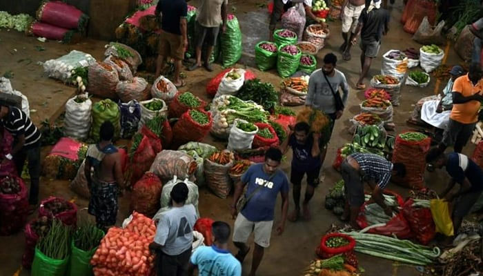 Vendors are selling vegetables at a market in Sri Lanka. — AFP/File