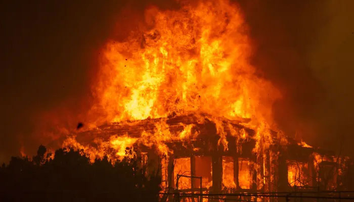 Representational image of a house on fire. — AFP/File