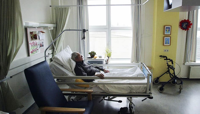 An unidentified man suffering from Alzheimers disease and who refused to eat sleeps peacefully the day before passing away in a nursing home in the Netherlands.—AFP/File