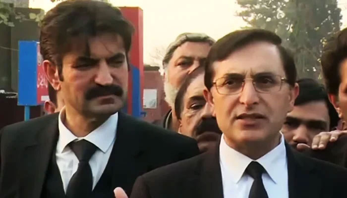 Senior PTI leader Barrister Gohar Ali Khan (right) addressing a press conference in Rawalpindi, on January 18, 2023, in this still taken from a video. Sher Afzal Marwat (left) also seen in the photo — YouTube/Geo News