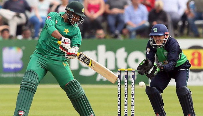 Pakistans Sharjeel Khan (L) plays a shot on the way to scoring a century (100 runs) during the first one day international (ODI) cricket match between Ireland and Pakistan at the Malahide stadium in Dublin. — AFP/File