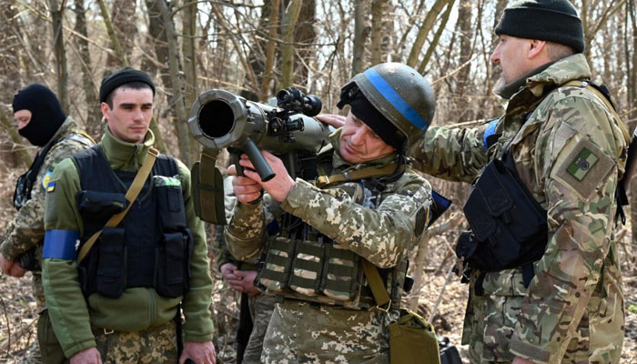 Members of the Ukrainian Territorial Defence Forces attend tactical, combat and first aid training course during Russias military invasion launched on Ukraine. — AFP/File