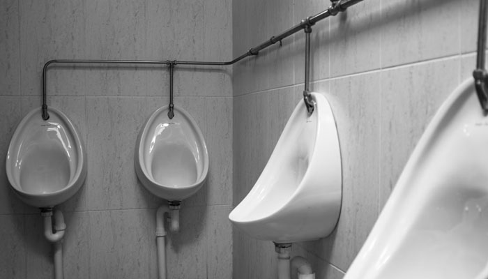This representational image shows urinal in toilet. — Unsplash/File