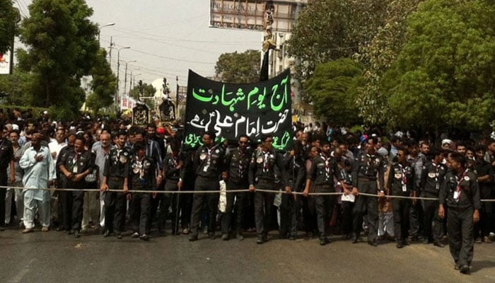 The undated image shows a mourning procession on Yaum-e-Ali. — APP File