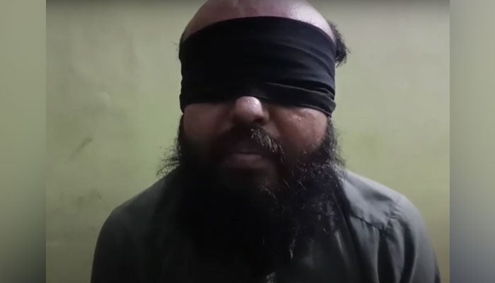 In this screengrab, gang war commander Faisal Mulla speaks in a video interview on March 30, 2024. — Youtube/@khabarwalay