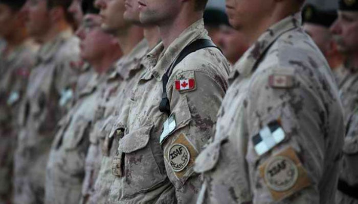 Canadian soldiers in formation at Camp. — AFP/File