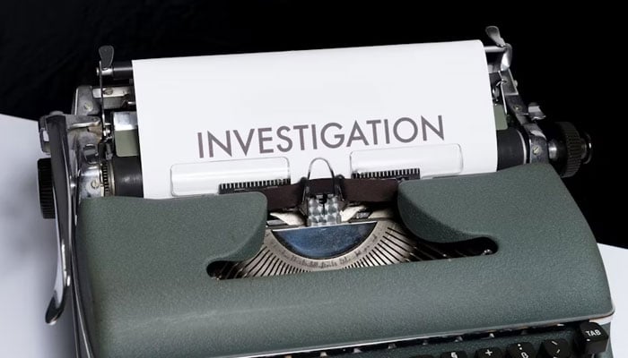 A representational image showing an investigation report being prepared via a typewriter. — Unsplash