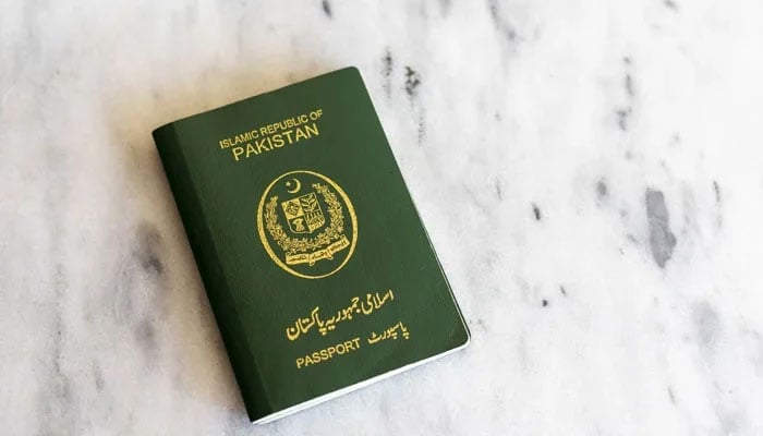 An undated photograph of the Pakistani passport. — X/@visafoto_com/File