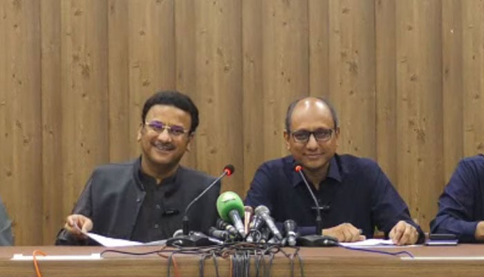 In this still, Sindh Home Minister Ziaul Hassan Lanjar (left) addresses a press conference along with Sindh Local Government Minister Saeed Ghani at the media cell of the Bilawal House on March 31, 2024. — Facebook/Surendar Valasai