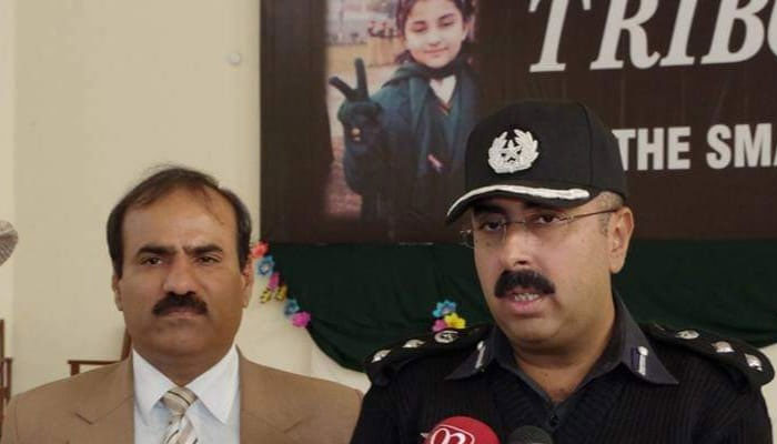 This image released on March 29, 2024, shows the newly-appointed Islamabad IG Syed Ali Rizvi (right). —Facebook/Abdul Wahid