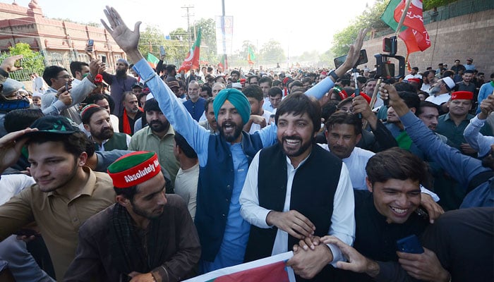 PTI workers protest seeking the release of the incarcerated party founder in Peshawar on March 31, 2024. — INP