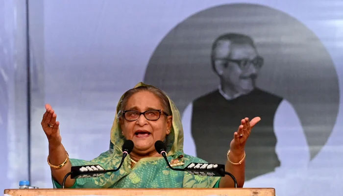 Bangladeshs PM Sheikh Hasina addresses a rally during an election campaign in Sylhet on December 20, 2023. — AFP