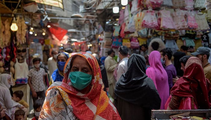 A representational image showing people at a busy market in Pakistan. — AFP/File