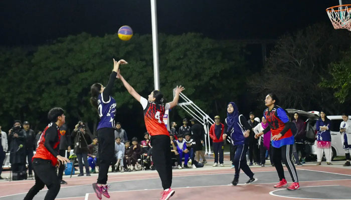 Women players can be seen playing basketball. — APP/File