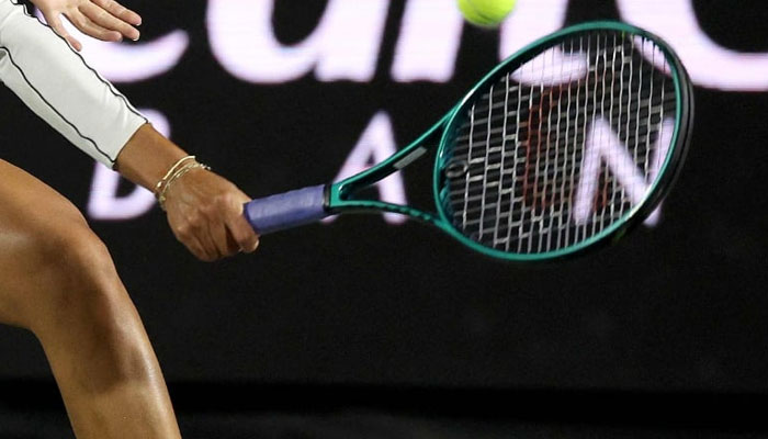 This representative image shows a woman playing tennis. — AFP/File
