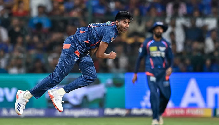 Lucknow Super Giants Mayank Yadav bowls during the Indian Premier League (IPL) Twenty20 cricket match between Royal Challengers Bengaluru and Lucknow Super Giants on April 2, 2024. — AFP