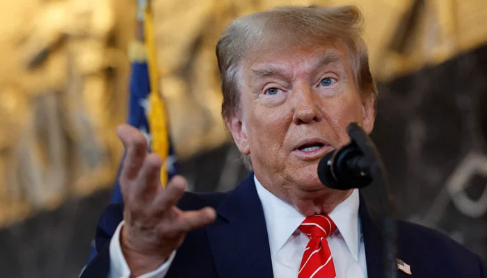 Former US President Donald Trump talks to reporters at the International Brotherhood of Teamsters headquarters on January 31, 2024, in Washington, DC. — AFP