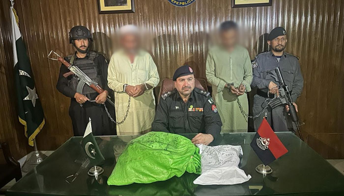This image shows police officials pictured with arrested smugglers image released on April 4, 2024. — Facebook/Khyber Police
