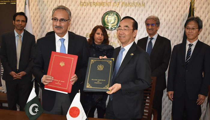 Japanese Ambassador Mitsuhiro Wada and Secretary Ministry of Economic Affairs Dr Kazim Niaz exchanges the agreement during a signing ceremony on April 4, 2024. — Facebook/Embassy of Japan in Pakistan