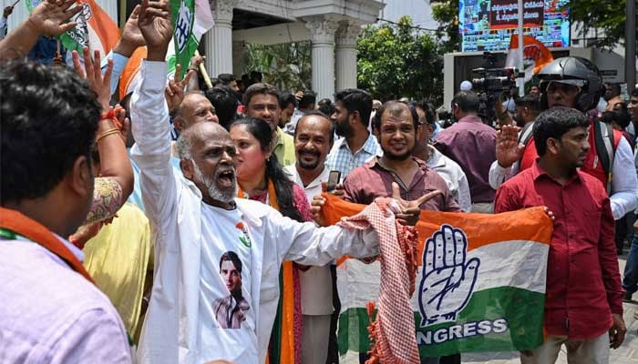 Congress supporters celebrate the party´s victory in the Karnataka state legislative assembly election in front of the Karnataka Pradesh Congress Committee (KPCC) office in Bengaluru on May 13, 2023. — AFP/File