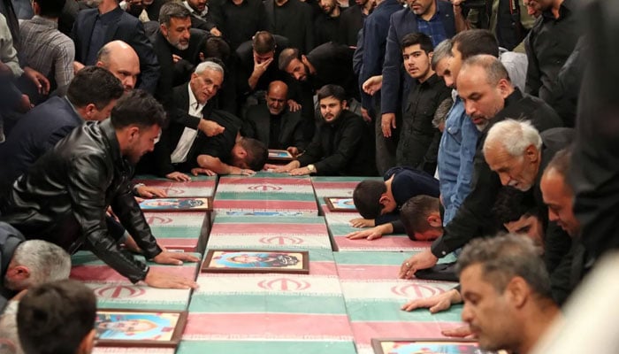 People atted the funeral ceremony held for victims who lost their lives in Israeli attack on Iran’s consulate building in the embassy compound in Damascus in Tehran, Iran on April 04, 2022. — Anadolu Agency