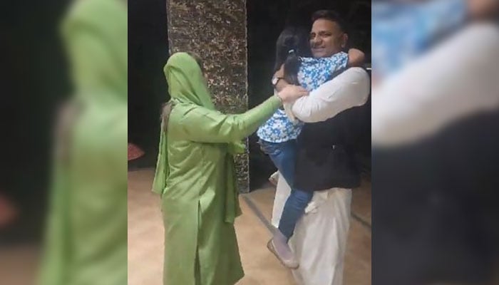 Former federal minister Fawad Chaudhary pictured alongside his daughter and wife Hiba Fawad Chaudhary upon returning home after being released from Adiala Jail on April 6, 2024. — Screengrab/X/@HibaFawadPk