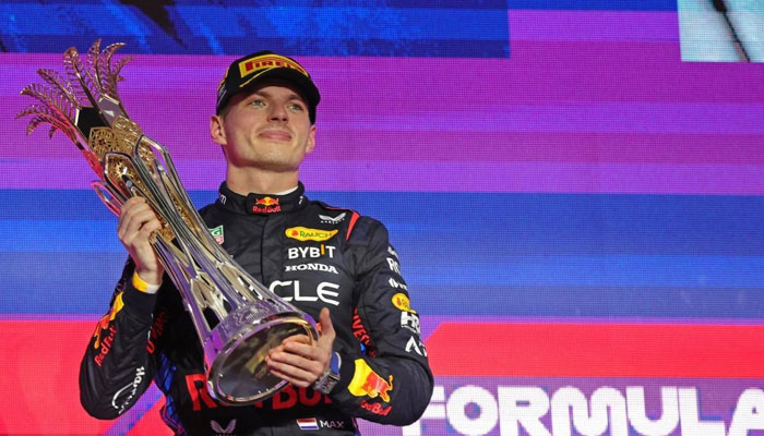 Red Bull Racings Dutch driver Max Verstappen celebrates winning the Saudi Arabian Formula One Grand Prix during the podium ceremony at the Jeddah Corniche Circuit in Jeddah on March 9, 2024. — AFP
