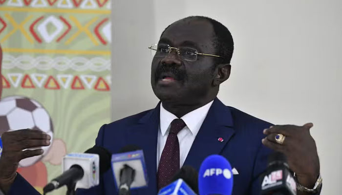 Cameroons Sports Minister Narcisse Mouelle Kombi speaks the press in Douala on January 29, 2022 during the 2021 Africa Cup of Nations. — AFP