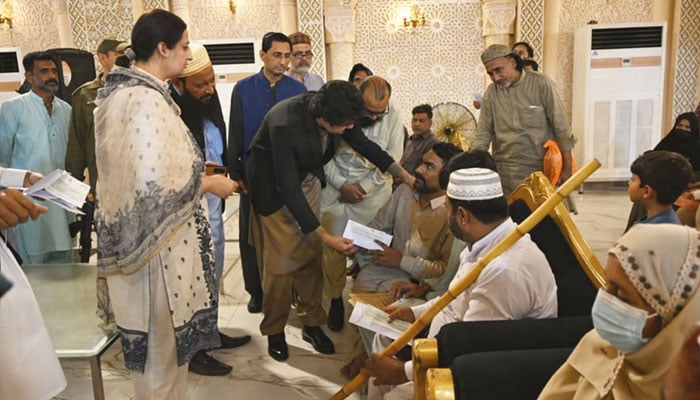 Punjab Provincial Minister for Social Welfare and Bait-ul-Maal, Sohail Shaukat Butt distribute financial assistance among deserving individuals on April 6, 2024. — Facebook/Social Welfare and Bait-ul-Maal Department, Government of the Punjab