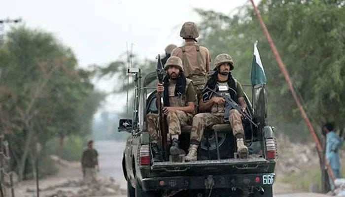 Pakistan Army soldiers patrol in a military vehicle at an undisclosed location. — AFP/File