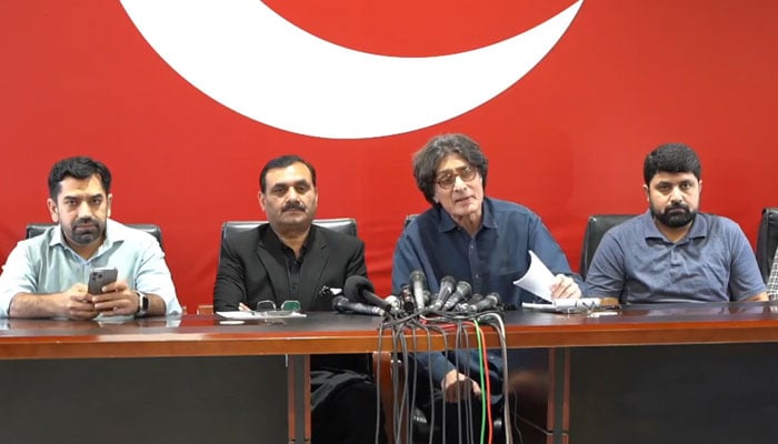 PTI Central Information Secretary Raoof Hasan speaks during a press conference along with PTI Secretary Information Punjab Shaukat Mahmood Basra in this still, released on April 6, 2024. — Facebook/Pakistan Tehreek-e-Insaf