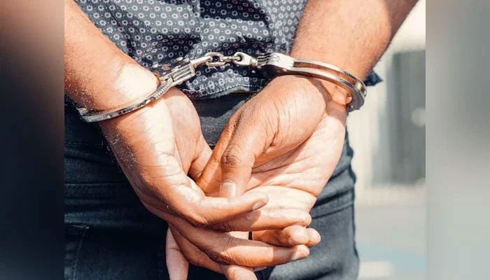 This representational image shows the handcuffed hand of a man. — Pexels/File