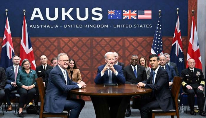 US President Joe Biden, center, participates in a trilateral meeting with British Prime Minister Rishi Sunak (R), and Australias Prime Minister Anthony Albanese (L), during the AUKUS summit on March 13, 2023. — AFP
