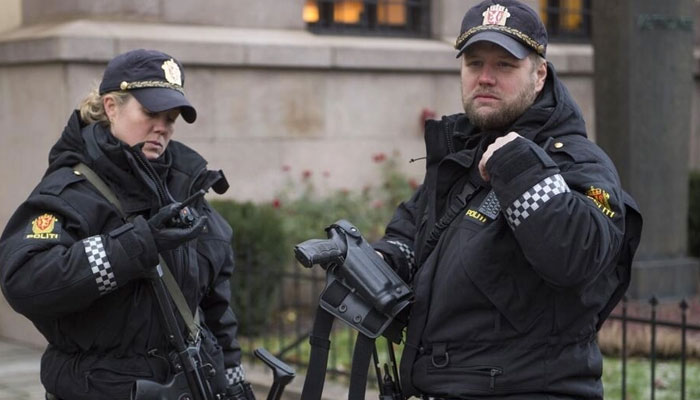 Armed police officers are seen outside the Nobel Institute in Oslo. — AFP/File
