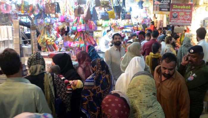 People are busy in Eid shopping ahead of Eid-ul-Fitar during the Holy Month of Ramadan-ul-Mubarak, at a local market in Rawalpindi on April 7, 2024. — PPI