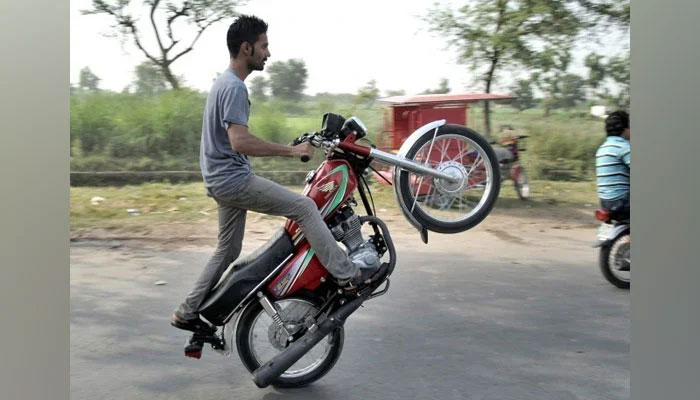 Young boy perform street stunts on motorcycle this image released on May 27, 2019. — Facebook/Alterbaik Rider Ranipur king