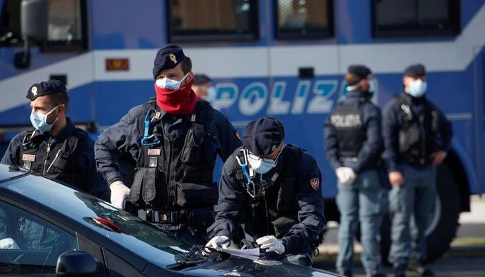 Italian policemen seen in this undated photo.— AFP/File