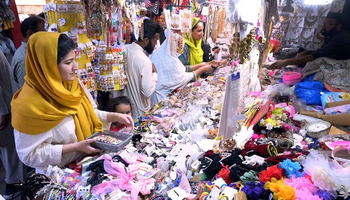 Families are busy in shopping for the Eid ul Fitr Festival at G-9 Markaz on April 9, 2024. — APP