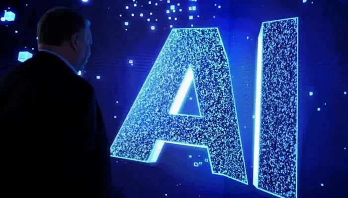 A visitor watches an AI sign on an animated screen at the Mobile World Congress, the telecom industry’s biggest annual gathering in Barcelona. — AFP/File