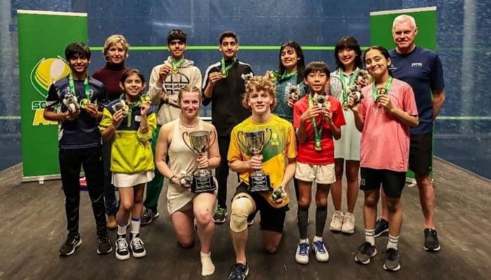 Squash players are posing for a group picture at the Junior Australian Open Squash Championship 2024. — X/@Zhchaudhri/File